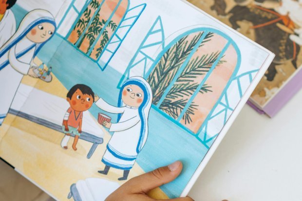 Child looking at pictures in a book